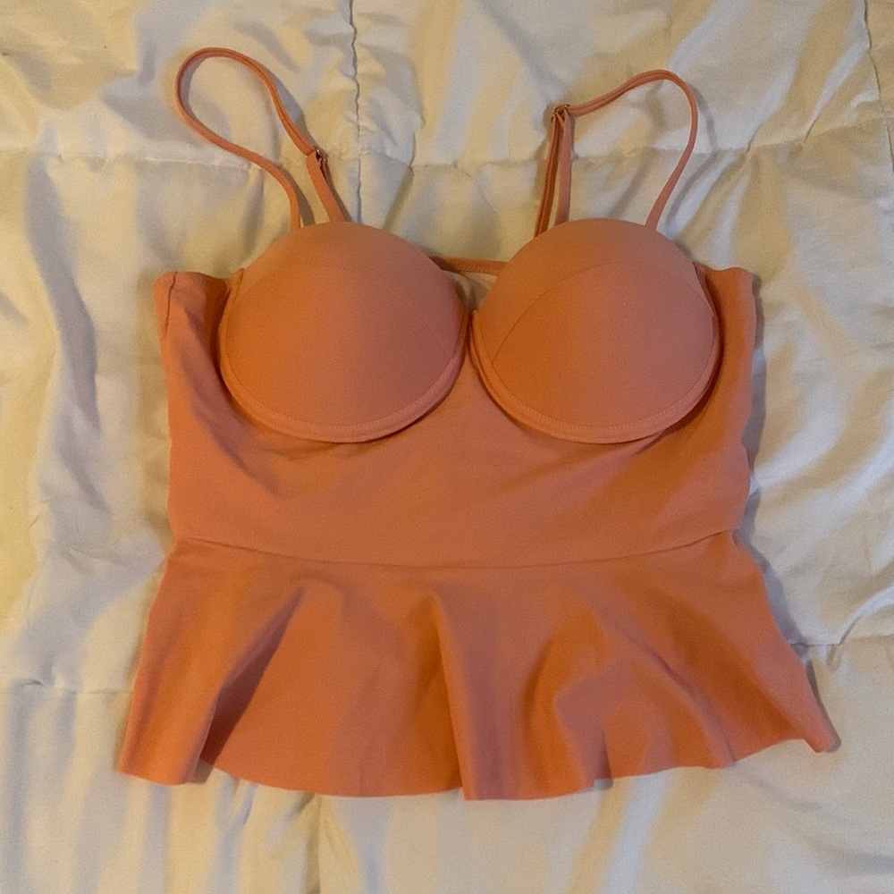 Peach peplum swim top